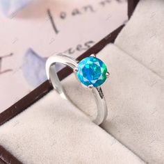 UNIQUE Teal Blue Peacock Green Silver Opal Ring,Sterling Silver Lab Created Opal Gemstone Ring,October Birthstone, Solitaire Ring Gift For Specification: Stone Name- Opal Stone Creation - Lab Created Stone Size - 7mm Stone Shape - Round Shape Stone Cut - Faceted  Stone Color- Round Side Stone - Pink Sapphire Accent Stone - Zircon Metal- 925 Sterling Silver Finished With Rhodium Method- Cast Personalization- Possible Occasion- Engagement Stone Style- Wedding Amethyst Ring Ring Size: We make rings Blue Fire Opal, Blue Opal Ring, Silver Lab, Silver Opal Ring, Blue Peacock, Ring Opal, Fire Opal Ring, Peacock Green, Green Opal