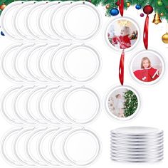 a bunch of white plates sitting on top of a table next to a christmas tree