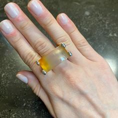 Our Ring Is Made From 100% Natural Agate, Known For Its Healing And Calming Properties. With This Ring, You'll Feel The Benefits Of Stress Relief And Positive Energy. Add A Natural Touch To Your Style With Our Natural Agate Ring. Made Of: Natural Agate Silver Plating (7-10 Microns) Over Brass Made In Brazil Disclaimer: Please Note That All Semiprecious Stones Have Imperfections And Are Part Of Their Own Beauty. Due To Changes In Lighting, A Product May Appear Different In Pictures Than It Does I Modern Carnelian Gemstone Jewelry, Modern Chalcedony Jewelry With Polished Finish, Modern Silver Agate Jewelry, Modern Agate Ring Jewelry, Elegant Silver Carnelian Ring, Silver Agate Open Ring, Silver Faceted Chalcedony Jewelry, Silver Agate Jewelry With Faceted Detail, Faceted Silver Chalcedony Jewelry