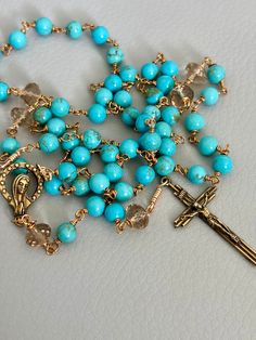 Completely wire wrapped, handmade, nonbreakable, vintage, turquoise rosary, exquisite Bohemian Beaded Cross Rosary, Turquoise Rosary Bracelet With Round Beads, Turquoise Spiritual Rosary Bracelet With Round Beads, Spiritual Turquoise Rosary Bracelet With Round Beads, Turquoise Rosary With Round Beads, Handmade Turquoise Cross Necklace Spiritual, Spiritual Turquoise Rosary With Round Beads, Handmade Spiritual Turquoise Cross Necklace, Handmade Turquoise Rosary Bracelet As Gift