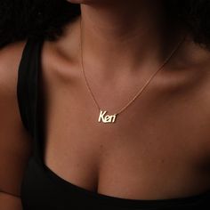 ✨ Personalized Touch: Your name or that of your loved one, beautifully crafted into a unique piece of jewelry, offering a truly personal connection to hold close to the heart. 💎 High-Quality Materials: Choose from luxurious 8K, 14K, or 18K gold to match your preference and style, ensuring durability and long-lasting shine. 🌟 Versatility in Gold: Whether you prefer the subtle elegance of 8K, the classic allure of 14K, or the rich depth of 18K, we have the perfect gold purity level for your taste. 🎁 Perfect Gift for Any Occasion: A thoughtful and custom-made present for Mother's Day, birthdays, bridesmaids, or a delightful surprise for that special someone. 🎨 Expert Craftsmanship: Meticulously handcrafted by skilled artisans, ensuring each necklace is a unique work of art with impeccable Meaningful Custom Name Jewelry For Birthday Gift, Meaningful Custom Name Jewelry For Anniversary, Birthday Initials Pendant Name Necklace, Sterling Silver Letter Jewelry For Birthday, Birthday Jewelry Initial Pendant With Name, Birthday Jewelry With Name Initial Pendant, Initial Pendant Jewelry With Name For Birthday, Dainty Birthday Jewelry With Letter Shape, Initials Name Necklace For Birthday On Mother's Day