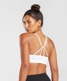 IT’S NOT YOU, IT’S YOUR SPORTS BRA With lightweight, breathable designs and supportive straps, you can rely on our sports bras to be there for you, and for yours. • Stylish v-neck gives a minimal look with a little more coverage• Strappy back with an adjustable slider to give different strap shapes SIZE & FIT• Light support• Model is 5'8" and wears size XS MATERIALS & CARE• Main: 78% Recyclable Polyester• Mesh: 91% Polyamide, 9% Elastane SKU: B6A6I-WB57 Gym Jacket, Minimal Look, Strappy Sports Bras, White Sports Bra, Sport Dress, Seamless Leggings, Sports Bras, Summer Essentials, Dresses With Leggings