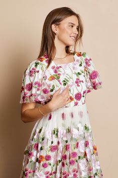 Beautiful floral embroidered dress with flowy sleeves, keyhole back closure, elastic back band in a stunning floral pattern. Self and Lining 100% Polyester Hand wash only. Aprox. measurements in inches: S:Length of self-45.5, length of lining-42 |Bust-35 |Waist-28 M:Length of self-46, length of lining-42.5 |Bust-37 |Waist-30 L:Length of self-47, length of lining-43.5 |Bust-39 |Waist-32 XL:Length of self-47, length of lining-43.5 |Bust-42 |Waist-36 modest dresses, modest dress, modest midi, modes Dress With Flowy Sleeves, Modest Midi Dress, Modest Boutique, Nursing Friendly Dress, Temple Dress, Modest Maxi, Modest Tops, Dress Modest, Modest Dress