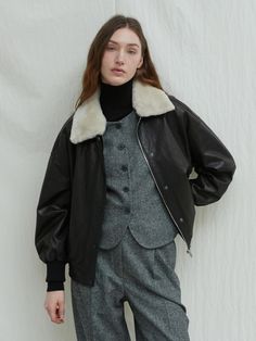 Composition : Shell: 100% natural leather, 100% lining: 100% polyester, Contrast: 100% natural fur , filling: 100% polyesterColor : BlackCountry of Origin : Republic of Korea Shearling Leather Jacket With Faux Fur Trim For Work, Chic Shearling Leather Jacket For Work, Chic Shearling Leather Jacket With Faux Fur Trim, Chic Leather Jacket With Faux Fur Trim, Sheepskin Leather Jacket With Faux Fur Lining For Work, Leather Fur Coat With Faux Fur Trim For Work, Classic Sheepskin Leather Jacket For Work, Classic Leather Jacket With Faux Fur Trim, Classic Fur Coat With Padded Collar For Fall