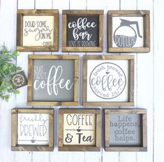 six framed wood signs with coffee and tea sayings on them, hanging on a white wooden wall