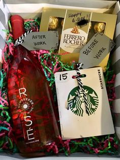 the starbucks gift box contains a bottle of coffee, chocolates, and other goodies