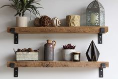 two wooden shelves with decorative items on them