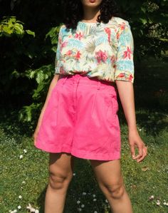 The perfect bright hot pink vintage Bermuda shorts. It's the perfect 90s nostalgia vintage piece for those looking for that 90s colourful rainbow aesthetic style and back to school style. Tag Size - 12 Measurements  The measurements are taken flat, please double the waist & hips measurements  Length from the waist - 44 cm  Waist - 37 cm /14 inches Hips - 54 cm /21 inches  Rise -32 cm In-Seam - 14 cm Material- Cotton 100% These are one of a kind vintage/preloved pieces hence has signs of wear, an 90s Inspired Spring Shorts, Pink High-waisted Bermuda Shorts For Spring, Pink Bermuda Cotton Shorts, 90s Inspired High-waisted Shorts For Summer, Pink Bermuda Shorts For Summer, 90s Relaxed Fit Shorts For Summer, 90s Style Short Length Shorts For Summer, Retro Pink Short Bottoms, Retro Pink Shorts