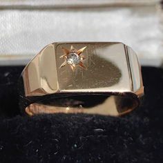 When ordering, please give us your phone number for safer Fedex shipping!RING SIZE:   8 1/2 US, 58 EU [FREE RESIZING] GOLD: 18 k. WEIGHT: 8.1 grams STONES: diamond DIAMOND WEIGHT: 0.03 ct. CONDITION: EXCELLENT Elegant diamond gold ring from the 1980s with Swedish BEH 18k L10 gold hallmarks. It features a 0.03 ct. diamond which is set in a star pattern.  The ring weighs 8.1 grams, the length of the top part is 8 mm and the width is 12 mm. The ring size is 8 1/2 US or 58 in EU, but we offer any re Rose Gold Diamond Signet Ring With Single Diamond, Vintage Gold Signet Ring With Single Diamond, Fine Jewelry Gold Signet Ring With Single Diamond, Gold Signet Ring With Single Diamond For Promise, Vintage Gold Engraved Ring With Single Diamond, Gold Rectangular Diamond Ring With Single Diamond, Gold Diamond Ring With Single Rectangular Diamond, Gold Diamond Ring With Rectangular Shape, Gold Diamond Ring With Vvs Clarity, Rectangular Shape