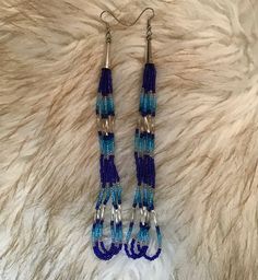 "Authentic Beautiful Native American Indian Jewelry Navajo Hand Beaded Long Dangle Earrings. Great for a gift❤️ Handcrafted by Navajo Artist R. Sellers These beautiful earrings are 6.75 in length and 1\" in width." Southwestern Blue Beaded Earrings With Round Beads, Blue Hand-strung Dangle Beaded Earrings, Southwestern Adjustable Dangling Bead Earrings, Adjustable Southwestern Beaded Earrings, Southwestern Style Beaded Drop Earrings, Southwestern Beaded Drop Earrings For Pierced Ears, Southwestern Style Blue Beaded Earrings, Handmade Southwestern Blue Beaded Earrings, Southwestern Dangle Beaded Earrings