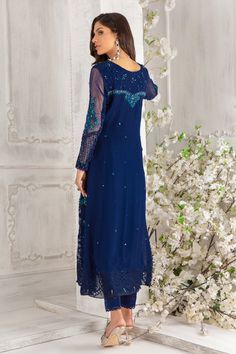 Simple paneled A-line chiffon ensemble, in stunning deep blue hue, featuring botanical embroidery on neckline, hem and sleeves, starburst sequin motifs all over shirt, dazzling sequin and crystals glistening neckline and sleeves. Eye Let embroidery border and pearls dangling’s complete the look. This stunning shirt is paired with straight pant and color-block dupatta featuring floral embroidery borders and trimmed with lace. A wardrobe must have. Shirt & dupatta Fabric: Pure Chiffon Shirt Length Embroidery Borders, Botanical Embroidery, Embroidery Border, Designer Outfit, Over Shirt, Pure Chiffon, Pakistani Designers, Chiffon Shirt, Shirt And Pants