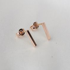 "14K Rose Gold Bar Earrings. 14K Rose Gold Simple Earrings. 14K Solid Rose Gold Minimalist Earrings 14K solid rose gold bar. It is 1.5mm wide. (Please select the length of bars : 3/8\", 1/2\" 5/8\")  The model in the picture wears 3/8\" bar earrings. 14K solid rose gold ear wire" Minimalist 14k Rose Gold Linear Earrings, Modern Rose Gold Linear Earrings For Formal Occasions, Dainty Rose Gold Linear Earrings For Formal Occasions, Rose Gold 14k Linear Earrings For Pierced Ears, Dainty Everyday Linear Rose Gold Earrings, Dainty Rose Gold Linear Earrings For Everyday, Everyday Rose Gold Sterling Silver Linear Earrings, Minimalist Rose Gold Linear Earrings For Gift, Minimalist Rose Gold Linear Earrings Gift