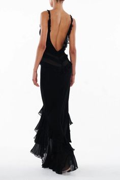 the back of a woman in a black dress