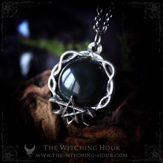 This pentagram pendant is adorned with a large natural rainbow obsidian. The pentagram symbolizes the union between the mind and the natural elements (water, air, earth and fire). - High quality pewter, 97% pure and hypoallergenic - Totally handmade - Natural rainbow obsidian - Sold without chain, choose your stainless steel chain of 46 cm / 17" or 60 cm / 24" (hypoallergenic) - Size of the pendant: 3,5 x 3,8 cm This pendant is an original creation of The Witching Hour It was designed and totall Gothic Onyx Necklace Gift, Gothic Onyx Necklace As A Gift, Black Gothic Necklaces For Larp, Mystical Healing Necklace With Cabochon, Spiritual Silver Obsidian Necklace, Mystical Black Jewelry For Healing, Handmade Black Witchy Necklace, Handmade Black Necklace For Larp, Mystical Black Necklace For Gift