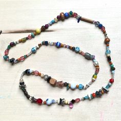 One Of A Kind Handmade Glass Bead Necklace With Vintage Y2k + 90s Beads Featuring: Vintage, Y2k/90s + Modern Beads Glass, Wood, Turquoise, Clay, Few Vinyl/Acrylic Curated Blend Of Small + X-Small Beads Chunk Scale Of 1 To 5: 1.2 Fine Quality Knotted Durable High Tenacity Nylon Cord 14.75” Drop Length 29” Total Length Brand: Www.Karlymortensen.Com Vintage + New Materials Handmade In Denver, Colorado Ready To Ship Featured With Daisy Vs Daisy Earrings - This Listing Is For Necklace Only Shop My Bo Bohemian Beaded Necklaces With Large Beads For Everyday, Spiritual Handmade Beaded Necklace For Everyday, Vintage Beaded Necklaces For Beach, Artsy Colorful Beaded Necklaces For Festivals, Vintage Beaded Necklace For Beach, Bohemian Glass Beads For Festival, Eclectic Colorful Beaded Necklace For Festival, Bohemian Festival Glass Beads, Festival Beaded Necklaces With Large Glass Beads