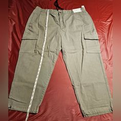 These New With Tag, Cool Big Man Cargo/Jogger In Arcadia Sage, Have The Adjustable Bungee At Each Ankle, Along With A Button, Zipper, Drawstring Waist, All In One Closure. Tag Size "40" Waist. Approx Measurements Laying Flat Waist-20=40", Front Rise=13" Inseam=26", Total Length=38" Baggy Cropped Leg Pants With Pockets, Baggy Cropped Pants With Pockets, Casual Cropped Leg Cargo Jeans, Casual Cropped Cargo Jeans, Relaxed Fit Cropped Cargo Pants With Side Pockets, Casual Cropped Leg Cargo Bottoms, Streetwear Cropped Pants With Pockets, Casual Cropped Cargo Style Bottoms, Casual Cropped Leg Pants With Side Pockets