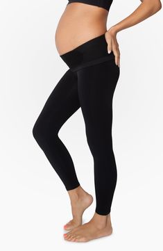 Our Bump Support™ Legging smooth, shape, and support from the waist down — pull them over the belly or roll them down for extra belly support. High Stretch Maternity Yoga Bottoms, Stretch Workout Leggings For Maternity, Workout Stretch Leggings For Pregnancy, Bump Friendly Black Leggings For Pilates, Black Bump Friendly Leggings For Pilates, Full Length Leggings With Micro-elastic Wide Waistband, Fitted Bump Friendly Bottoms For Pilates, Supportive Fitted Yoga Bottoms, Maternity Bump Friendly Fitted Leggings