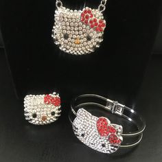 X Large Hello Kitty 3 Piece Crystal Set Necklace; Bracelet & Ring Red Condition: 100% Brand New Material: Metal & Crystal Necklace With Toggle Clasp Closure 20" In Length Bracelet Diameter(Approx): 6.5cm(2.6inch) Adjustable Ring Hello Kitty Jewelry For Valentine's Day Gift, Hello Kitty Adjustable Jewelry For Gifts, Adjustable Hello Kitty Jewelry As Gift, Adjustable Hello Kitty Jewelry Gift, Hello Kitty Sterling Silver Jewelry Gift, Adjustable Hello Kitty Jewelry, Hello Kitty Crystal, Hello Kitty Jewelry, Bracelet Ring