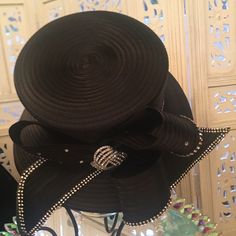 Perfect For Any Occasion, Especially Opening Day At The Races. Classy And Elegant. 100% Polyester. The Special Details Of The Rhinestones And The Ribbon Like Design Make It A Must Have In Your Hat Collection. It Can Be Adjusted To Your Size. Black Evening Hat With Rhinestones, Black Evening Hats With Rhinestones, Elegant Evening Hats With Rhinestones, Black Hat With Rhinestones For Evening, Elegant Black Hats With Rhinestones, Elegant Embellished Party Hats, Black Adjustable Embellished Hats, Adjustable Black Hats With Rhinestones, Adjustable Black Hat With Rhinestones