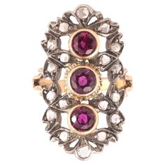 The three oval ruby set in vertical formation, within a rose-cut diamond border, mounted in silver and gold Size : 61/2 Weight : 7gr. Italian Engagement Ring, Art Nouveau Engagement Ring, Ruby Set, Ruby Rings, Three Stone Diamond Ring, Three Stone Diamond, Ruby Stone, Enamel Ring, Italian Art