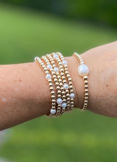 PEARL AND GOLD FILLED BRACELET * Big Fresh Water Pearl (10mm) Gold Filled Beads (4mm) ...ONE PEARL * Fresh Water Pearls (6mm) with Gold Filled (4mm beads) ... SS & PEARLS SET OF 2 : ONE PEARL + GF & PEARLS SETS OF PEARLS : GF &PEARLS ( without the BIG PEARL) * SET of 2 GF &PEARLS * SET of 3 GF &PEARLS * SET of 4 GF &PEARLS * SET 0f 5 GF &PEARLS Thank you for visiting our shop, I hope you enjoy your jewelry as much as we LOVE making it for YOU * STRETCHY to fit perfect Classic White Bracelets For Mother's Day, Classic Rose Gold Pearl Bracelet For Wedding, Adjustable Pearl White Beaded Bracelet For Anniversary, Pearl White Bracelet For Mother's Day Gift, Classic Bracelets For Wedding And Mother's Day, Classic White Pearl Bracelet For Mother's Day, Classic Wedding Bracelets For Mother's Day, Classic Wedding Bracelets, Mother's Day Pearl White Pearl Bracelet Gift