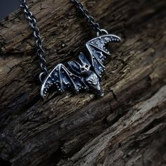 "I made this Bat pendant necklace highly detailed, every casting is made to order in my studio from sterling silver (925). There is a lot of fire heat and handwork involved, so every piece is slightly different and made just for you. In the final steps, I cover this pendant with a black patina and partly polish it to achieve a contrastable and eye-catching look. To ensure a long-lasting finish - with a purchase you will receive metal care instructions. The dimension of the Bat pendant is around: Afro Jewelry, Branded Jewellery, Bat Pendant, Bat Jewelry, Metal Bat, Bat Necklace, Gift Wrapping Services, Necklace Sterling Silver, Jewelry Branding