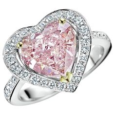 Luxury Heart Cut Sparkling Stones Jewelry, Luxury Pink Ruby Ring With Pave Setting, Luxury Heart Cut Gemstone Jewelry, Luxury Open Heart Diamond Jewelry, Luxury Pink Gia Certified Diamond Ring, Luxury Pink Diamond Ring With Brilliant Cut, Pink Gia Certified Diamond Ring For Formal Occasions, Luxury Pink Brilliant Cut Diamond Ring, Formal Pink Gia Certified Diamond Ring