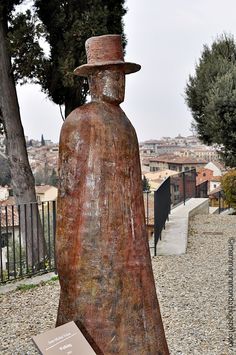 a large statue with a hat on it's head