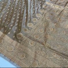 We have a major varieties of colour and design available, but due to heavy demand we may not be able to provide the exact colour and design of your choice instantly. So please inquire before ordering, if the colour of your choice is not available at stock then we will provide you with different designs with similar colour combination. pure handloom katan  Banarasi saree in India beige high demand colour. Semi-stitched Gold Banarasi Silk Traditional Wear, Semi-stitched Gold Lehenga With Meenakari, Gold Chanderi Traditional Wear For Wedding, Unstitched Gold Raw Silk Traditional Wear, Semi-stitched Gold Traditional Wear With Cutdana, Unstitched Gold Traditional Wear With Cutdana, Gold Semi-stitched Traditional Wear With Cutdana, Gold Traditional Drape In Raw Silk, Gold Traditional Wear With Cutdana, Semi-stitched