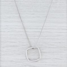 Gem: Natural Diamonds - 0.20 Total Carats, Round Brilliant Cut, F - G Color, VS ClarityMetal: 18k White GoldWeight: 19.2 Grams Stamps: 750 Tiffany & Co Gehry Style: Snake ChainClosure: Lobster ClaspChain Length: 18"Width: 1.2 mmPendant dimensions: 26 mm Each piece is thoroughly examined and refinished as needed by our professional jewelers, graded by our in-house GIA (Gemological Institute of America) Graduate Gemologist, and inspected for quality before being carefully packaged and promptly Modern Diamond Cut Necklace In Diamond White, Modern Diamond Cut White Diamond Necklace, Modern Diamond Cut Pendant Necklace, Modern Diamond Cut White Necklace, Cubic Zirconia Box Chain Necklace, Diamond Pendant Necklace With Box Chain, Diamond White Box Chain Necklace, Elegant Sterling Silver Chain Necklace With Square Pendant, Sterling Silver Box Chain Necklace For Wedding