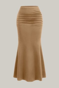 Indulge in the exquisite elegance of our High Waist Pleated Fish Tail Skirt. With a stunning ruched detail and a sophisticated mermaid silhouette, this skirt effortlessly accentuates your natural waistline and falls gracefully at midi length. The medium stretch knitted fabric adds comfort and versatility to this luxurious piece. Perfect for any occasion, this skirt is a must-have for those with a taste for the finer things in life. No sheerness, just sheer perfection. 95% Polyester, 5% Elastane Stretch Fishtail Bottoms For Evening, Evening Stretch Fishtail Bottoms, Fitted Maxi Skirt With Folds For Party, Fitted Party Maxi Skirt With Folds, Stretch Skirt With Folds, Elegant Solid Bottoms With Folds, Chic Stretch Skirt With Folds, Party Maxi Skirt With Folds, Solid Ruched Midi Skirt