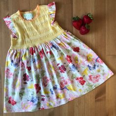 Nwot Baby Lulu Tiffany Dress. Yellow Top With Trimming On The Sleeves. Jersey Knit Cotton Skirt With Multi-Color Flowers. Please Send Reasonable Offers, And Feel Free To Ask Questions! Spring Twirl Dress For Playwear, Cute Spring Twirl Dress For Playwear, Cotton Twirl Dress For Spring Garden Party, Spring Floral Print Twirl Dress For Playtime, Playful Spring Sundress For Playwear, Spring Playtime Twirl Dress With Flutter Sleeves, Spring Flutter Sleeve Twirl Dress For Playdate, Cute Sundress For Spring Playwear, Cute Spring Sundress For Playwear