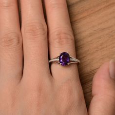 It is a natural amethyst ring. The main stone is 7mm*9mm oval cut, weight about 1.77 carats. The basic metal is sterling silver and plated with rhodium. To change the metal to a solid gold (white/rose) or platinum is also available, please ask for a quotation if you want. You can also go to my shop Home for more elegant rings: https://www.etsy.com/shop/godjewelry?ref=hdr_shop_menu More rings: https://www.etsy.com/shop/godjewelry?ref=l2-shop-header-avatar Customization is always welcome and pleas Oval Amethyst Ring With Prong Setting In Cubic Zirconia, Oval Amethyst Ring With Cubic Zirconia In Prong Setting, Oval Amethyst Ring With Cubic Zirconia For Promise, Oval Amethyst Cubic Zirconia Promise Ring, Oval Amethyst Cubic Zirconia Ring For Anniversary, Oval Purple Amethyst Ring With Cubic Zirconia, Oval Amethyst Ring With Cubic Zirconia, Oval Amethyst Cubic Zirconia Ring, Oval Amethyst Promise Ring In White Gold