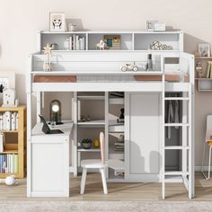 a white loft bed with desk and shelves