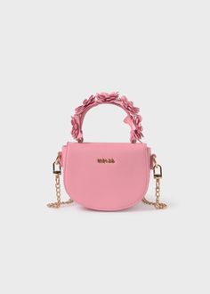 The Abel & Lula Flower Handle Bag is a stylish and sophisticated purse perfect for girls' Spring and Summer outfits. Made with 100% polyurethane on the outside and lined with 100% polyester, this bag is both durable and fashionable. The delicate blush pink color adds a touch of femininity to any look. Pink Single Handle Bag For Daily Use, Pink Fashion Bags With Zipper Closure, Pink Fashion Accessory Bag With Zipper Closure, Trendy Spring Crossbody Evening Bag, Party Bags With Adjustable Strap For Spring, Spring Evening Satchel Shoulder Bag, Pink Satchel Bag With Single Handle, Spring Evening Shoulder Bag With Detachable Strap, Spring Handheld Shoulder Bag