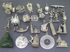 Choice of vintage sterling silver (previously worn) charm for charm bracelets. A variety of sizes and conditions so please view photos and ask any questions if needed though they all have age related wear and/or patina, pictures tell the best story. They are all either marked (some 835 or 800) or tested and guaranteed sterling silver if unmarked. Great variety here! Options are: Movable Carriage (wheels move) Capitol Building Toby Mug July Angel Police/Bobby Hat Pencil (no writing tip) Eiffel Tower Marshall Fields Clock Opening Cash Register with Number 6 Inside Movable German Dancing Couple (girl spins) Lucky Shoe Gondola Koln/Cologne Cathedral Viking Ship Leaning Tower of Pisa Jesus Giving Communion Carved Jade Buddha Leo Lion Opening Stein Capitol Records Record Chalet Visit Ribbons Edg Spiritual Silver Jewelry Souvenir, Spiritual Silver Charms For Gifts, Antique Hallmarked Charm Bracelet As Gift, Antique Charm Bracelet Gift, Antique Charm Bracelet With Vintage Charm As Gift, Antique Charm Bracelet As Gift, Vintage Engraved Charm Bracelet Gift, Vintage Handmade Charms For Gifts, Vintage Handmade Charms For Gift