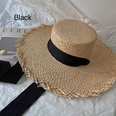 This Boater Hat for Women is made of premium straw, providing durability and comfort that won't let you down. The superior materials guarantee a stylish and long-lasting hat that can protect you from the sun. This stylish hat is perfect for any outdoor occasion, shielding the face and neck from the sun and keeping you looking fashionable. Black Paper Straw Hats For Summer, Black Paper Straw Hat For Spring, Adjustable Black Straw Hat Made Of Paper Straw, Lightweight Black Straw Hat, Casual Black Paper Straw Hat, Black Paper Straw Hat With Curved Brim, Black Paper Straw Summer Hat, Spring Black Paper Straw Sun Hat, Black Summer Panama Hat For Beach