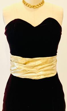 "Vintage from 1980's  Deep red velvet  Gold Sash  Strapless  Boning through bodice Lined Column shape  Floor length  Split at to the knee at the front  Zipper at the back  Would best fit XS pit to pit - 16\" waist  - 26\" hips - 36\" dress length - 50\" length of split at front - 24.5\"" Velvet Strapless Dress, Deep Red Velvet, Plunge Dress, Halloween 2024, Prairie Dress, Hand Knitted Sweaters, Summer Set, Cute Sets, Plaid Jacket