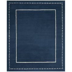 a blue rug with white dots on the edges and a square in the middle,