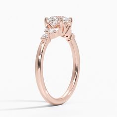 Lab Created Verbena Diamond Engagement Ring - 14K Rose Gold. This feminine, nature-inspired ring features four dazzling marquise-shaped diamonds elegantly accenting a center gem in a bead prong basket setting. Round diamond accents sparkle from the shoulders (1/6 total carat weight). Formal Three Stone Rose Gold Ring, Elegant Rose Gold Three Stone Ring, Formal Rose Gold Three Stone Ring, Elegant Marquise Cluster Ring In 14k Gold, Elegant Marquise Cut Cluster Ring For Anniversary, Elegant 14k Gold Marquise Cluster Ring, Luxury Marquise Cut Rose Gold Ring, Luxury Marquise Cut Rose Gold Wedding Ring, Luxury Rose Gold Marquise Diamond Ring