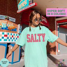 This Salty beach shirt is the perfect t-shirt for your summer vacation! Our Comfort Colors tees are super soft, DTG printed (printed with ink), and 100% cotton. ❗❗There may be a slight difference in the colors due to different monitors. ❗❗ 🌞 HOW TO ORDER 🌞 * Select your size and color from the drop-down menu * Add your shirt to cart. If you would like more than one, add each one to cart individually. * Proceed to check out! * Your shirt will be ready to ship in 1-3 days! 🌞 SIZING 🌞 Check the Oversized Summer Beach Shirt, Beach Season Short Sleeve T-shirt For Day Out, Trendy Cotton Beach Camp Shirt, Trendy Cotton Camp Shirt For Beach, Oversized Vacation Shirt With Letter Print, Oversized Letter Print Shirt For Vacation, Casual Green Shirt For Beach Season, Summer Camp Shirt With Funny Print And Short Sleeves, Summer Shirt With Graphic Print For Day Out