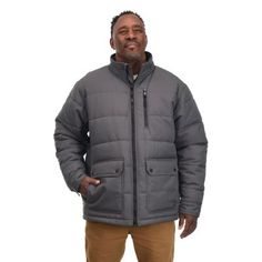 Suit up for cold weather by donning the Ridgecut Men's Nylon Puffer Jacket. Made with polyfill insulation, this wind-resistant jacket helps block out the elements and keep you warm. It's made from nylon canvas material which is super durable and abrasion resistant to preserve the quality of the jacket over time. Handwarmer pockets provide added warmth. Shell fabric made with durable, abrasion-resistant 100% nylon canvas TOUGHSHIELD design built to shield tough water-based stains and provide maxi Gray Nylon Outerwear For Cold Weather, Gray Nylon Puffer Jacket For Cold Weather, Gray Down Puffer Jacket For Outdoor, Outdoor Gray Down Puffer Jacket, Weatherproof Gray Nylon Outerwear, Gray Weatherproof Nylon Outerwear, Gray Nylon Puffer Jacket For Winter, Gray Puffer Jacket For Outdoor, Winter Nylon Sport Coat For Outdoor Activities