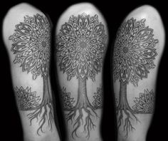 three tattoos with trees on their legs and roots growing out of the back of them