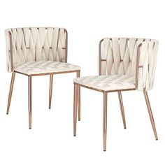 two chairs with wooden legs and white upholstered fabric on the back, one in gold