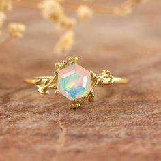 Natural white fire Ethiopian opal ring for women, statement ring, Women ring, October birthstone, 925 Sterling silver ring, Gold ring, Genuine fire Ethiopian opal ring. *Other Similar Jewelry Available Here* https://www.etsy.com/shop/AreebaJewelry Details:- Gemstone - Ethiopian Opal Stone Color Available - Natural White  Stone Setting - Prong Fire - Rainbow Multi fire Birthstone - October birthstone Quality - AAA Grade Stone Size - 5 MM Rize Size - 5 US TO 9 US Available Type - 100% Natural Opal Iridescent Opal Jewelry For Anniversary, Fine Jewelry Ethiopian Opal Ring As Gift, Opal Moonstone Open Ring For Gift, Opal Crystal Ring With Birthstone For Gifts, Opal Birthstone Crystal Ring As Gift, Opal Birthstone Crystal Ring For Gift, Ethiopian Opal Birthstone Ring As Gift, Opal Crystal Promise Ring Fine Jewelry, Iridescent Opal Ring As Gift