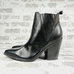 New Oh So Stylish The Gadri Bootie By Marc Fisher Ltd. Pairs Perfectly With Skinny Jeans. Upper Material: Leather Sole Material: Synthetic Lining Material: Synthetic Sizing/Fit True Size Closure Type & Location: Pull On, Slip On Black Pointed Toe Chelsea Boots For Spring, Edgy Pointed Toe Heeled Boots For Spring, Edgy Spring Heeled Boots With Pointed Toe, Fall Edgy Heeled Boots With Stacked Heel, Pointed Toe Moto Boots With Stacked Heel For Work, Edgy Heeled Boots With Reinforced Heel For Fall, Edgy Black Pointed Toe Chelsea Boots, Edgy Black Chelsea Boots With Pointed Toe, Spring High Ankle Chelsea Boots For Workwear