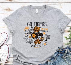 Tigers retro spirit tees!   We offer youth sizing as well.  We print on soft Bella Canvas Brand tshirts. Contact us for a custom design in your team! School Spirit Graphic T-shirt Fan Gear, School Spirit Graphic T-shirt For Fan Gear, School Spirit Graphic T-shirt, School Spirit Graphic Print T-shirt For Fan Gear, School Spirit T-shirt With Graphic Print, Collegiate T-shirt With Custom Print For Game Day, School Spirit T-shirt With Screen Print For Fans, Sports Fan Graphic T-shirt For College, Sports Fan Graphic Print T-shirt For College