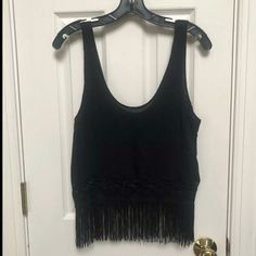 This Is A Forever 21 Brand Sleeveless Tank Blouse / Top In A Women’s Size Small. Top Is Solid Black And Has Solid Black Fringe Sewn Along The Bottom Hem. Top Is Brand New With Tag Still Attached. Would Be Such A Great Addition To Your Spring And Summer Wardrobe! Top Measurements: Armpit To Armpit Flat Measurement Across The Front: 19” Top Of Shoulder To Bottom Of Fringe Hem: 25” (Fringe Has A 5” Drop) Willing To Consider Reasonable Offers Casual Sleeveless Blouse Crop Top For Night Out, Chic Fringe Tank Top For Summer, Fitted Tank Top For Going Out In Summer, Crop Top Tank Top For Date Night In Spring, Sleeveless Fringe Crop Top For Night Out, Summer Crop Top For Going Out, Fitted Sleeveless Tank Top With Fringe, Fitted Sleeveless Fringe Tank Top, Trendy Sleeveless Fringe Tops