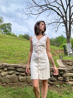 J. Crew linen a-line midi. 😍 I swoon over this beaut. Sorry for the wrinkles y'all- everything gets steamed before shipping.  A beautiful creamy color lined with cotton- so she isn't see through.  🌱 100% linen.  Shown on a 32 bust | 26 waist | 38 hips  For me perfectly but had to unbutton to put on. I think the bust could work for someone a smidge bigger but I wouldn't go past 38 hips.  Measurements 📏  * 🏷️ 0  * 17" ptp  * 13.5" waist  * 17.5" hips  * 35.5" long Fitted Cream Linen Summer Dress, Beige A-line Linen Dress For Spring, Spring Beige A-line Linen Dress, Beige Linen Dress For Spring Garden Party, Spring Neutral Linen Dress, Fitted Cream Linen Dress, Cream Cotton Linen Dress For Summer, Fitted Beige Linen Dress For Spring, Beige Linen Dress For Spring Day Out