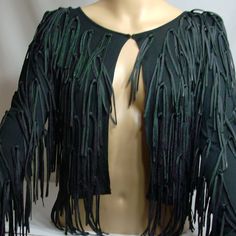 Deep Black Tassel Sweater Cardigan Nwot. Never Worn Size S. 100% Rayon. Shoulder 15, Bust 15, Length 14.5, Sleeve 25, Bicep 5.5. Measured In Inches Laying Flat. Fitted Long Sleeve Top With Fringe, Fitted Fringe Outerwear For Parties, Elegant Fall Fringe Tops, Elegant Fringe Tops For Fall, Fitted Party Outerwear With Fringe, Fitted Fringe Tops For Evening, Elegant Fitted Fringe Outerwear, Evening Fringe Tops For Fall, Fitted Black Outerwear With Fringe